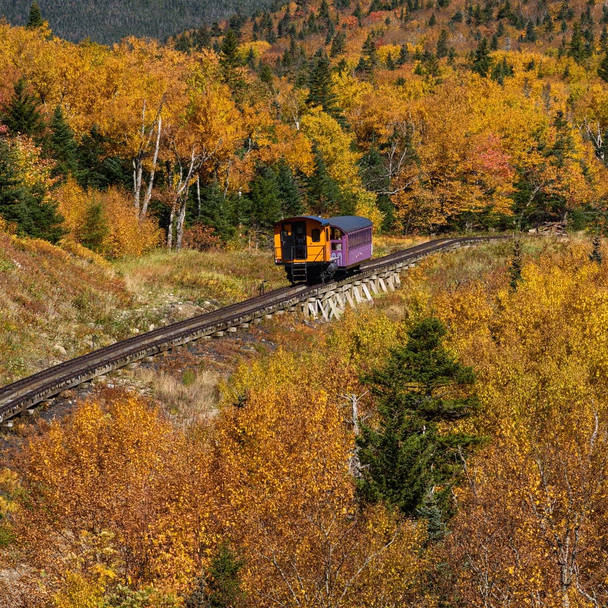 Mount Washington Cog Railway climbing through fall foliage
