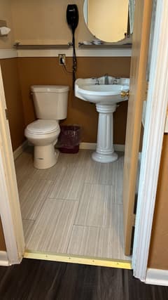 Renovated Briarcliff bathroom with sink and toilet